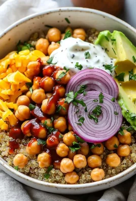 BBQ Ranch Chickpea Quinoa Bowls topped with fresh ingredients and tangy dressing.