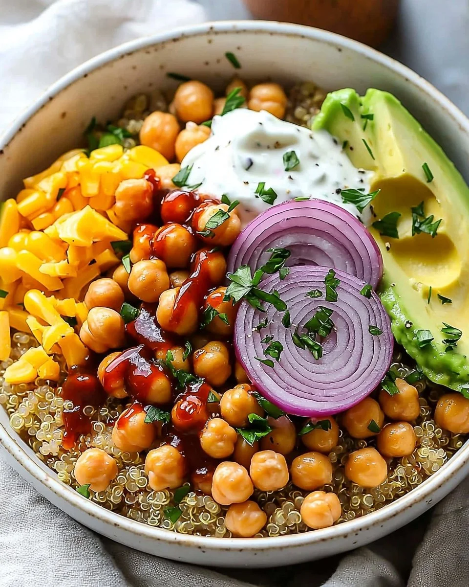 BBQ Ranch Chickpea Quinoa Bowls topped with fresh ingredients and tangy dressing.