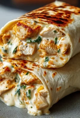 Cheesy Chicken Garlic Wraps with fresh ingredients and melted cheese