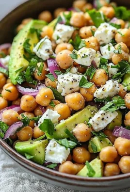 Chickpea Feta Avocado Salad with fresh vegetables and herbs