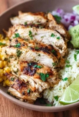 Plate of Cilantro Lime Chicken garnished with fresh cilantro and lime slices.