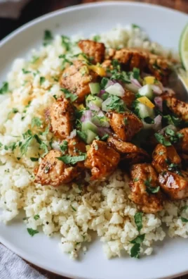 Cilantro Lime Chicken served with riced cauliflower on a plate