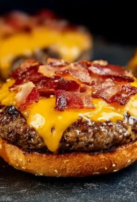Delicious Crack Burgers served on a plate with toppings and fries