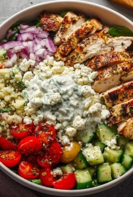 Delicious Greek chicken bowls with fresh ingredients and vibrant toppings