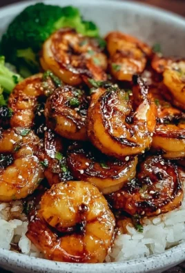 Delicious honey garlic shrimp served with vegetables on a plate