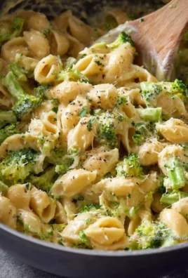 One Pot Healthy Broccoli Mac and Cheese in a creamy sauce with fresh broccoli