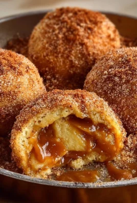 Delicious simple caramel apple pie bombs with caramel drizzle