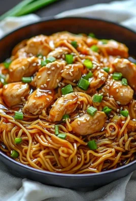 Delicious Sticky Garlic Chicken Noodles served in a bowl