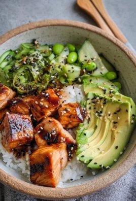 Delicious sticky gluten-free teriyaki salmon sushi bowl with fresh ingredients
