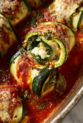 Plate of delicious Zucchini Rollatini with cheese and herbs