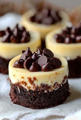 Brownie Bottom Mini Cheesecakes with chocolate base and creamy topping