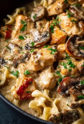 Plate of creamy Chicken Stroganoff with mushrooms and herbs