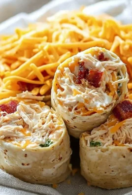 Delicious Crack Chicken Pinwheels on a serving platter