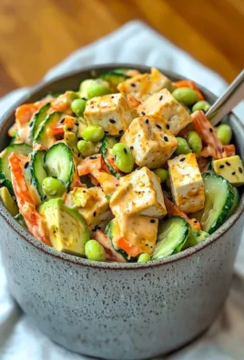 A creamy Asian cucumber salad with fresh cucumbers and a savory dressing.