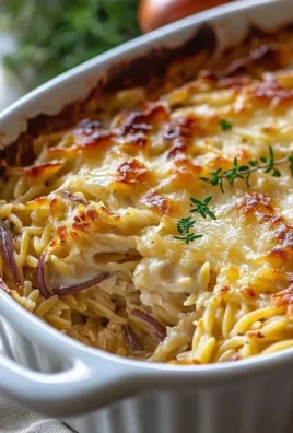 Delicious French Onion Chicken Orzo Casserole served in a baking dish.