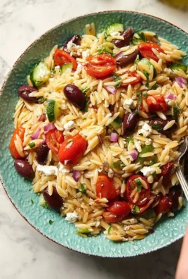 Greek Orzo Salad with fresh vegetables and feta cheese