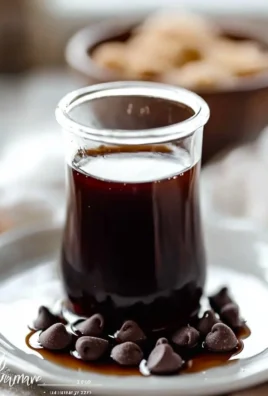 Homemade chocolate chip cookie dough syrup drizzled over desserts.