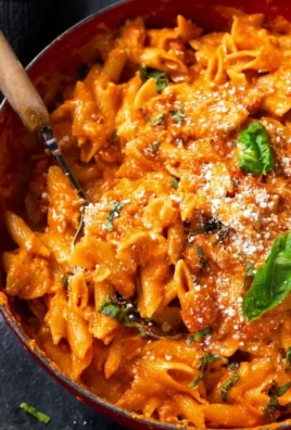 Delicious one pot creamy tomato pasta topped with fresh basil and cheese