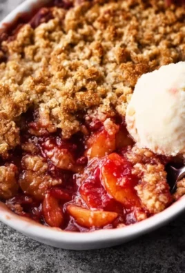 Delicious homemade rhubarb crisp with a golden brown oat topping