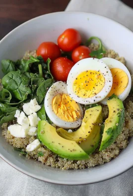 Savory quinoa breakfast bowl with vegetables and spices