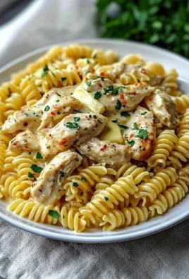 Delicious creamy garlic parmesan chicken pasta served in a bowl
