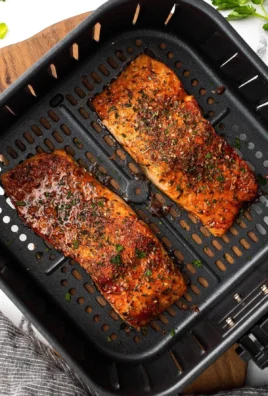 Delicious easy air fryer salmon fillets ready to serve with side dishes