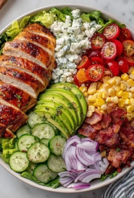 Fresh grilled chicken salad with vibrant vegetables and dressing
