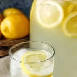 A refreshing glass of homemade lemonade made with fresh lemons