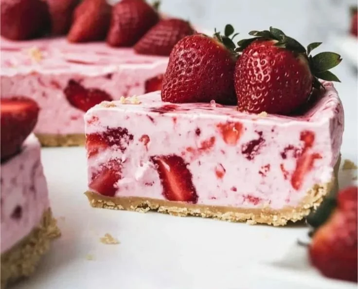 Delicious Strawberry Icebox Pie with fresh strawberries and whipped cream.