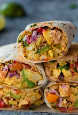 Delicious vegan breakfast burritos filled with fresh vegetables and spices