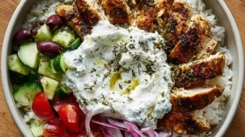 Delicious Chicken Gyro Bowls with fluffy rice and creamy tzatziki sauce