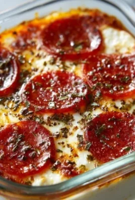 Delicious Cottage Cheese Pizza Bowl topped with fresh vegetables and cheese.