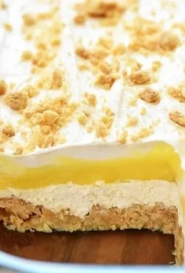 Heavenly Oreo Lemon Dessert with creamy layers and crumbled Oreo crust