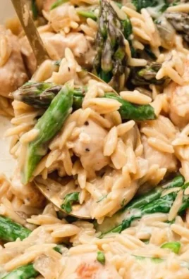 High protein chicken orzo dish with vegetables and herbs