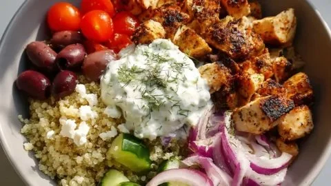 High Protein Mediterranean Chicken Bowls recipe served in a colorful dish