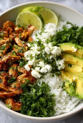 Honey Lime Chicken served in a healthy avocado rice bowl