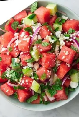 Refreshing watermelon feta salad with mint and arugula