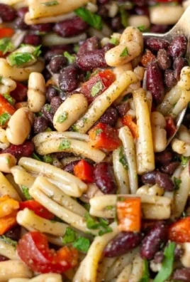 Delicious 3 Bean Pasta Salad with colorful beans and fresh vegetables