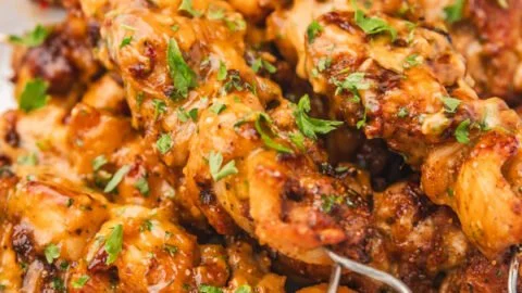 Delicious Air Fryer Bang Bang Chicken topped with creamy sauce and spices