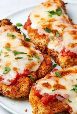 Delicious air fryer chicken parmesan served with pasta and marinara sauce