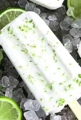 Delicious Coconut Zesty Popsicles ready to enjoy on a hot summer day.