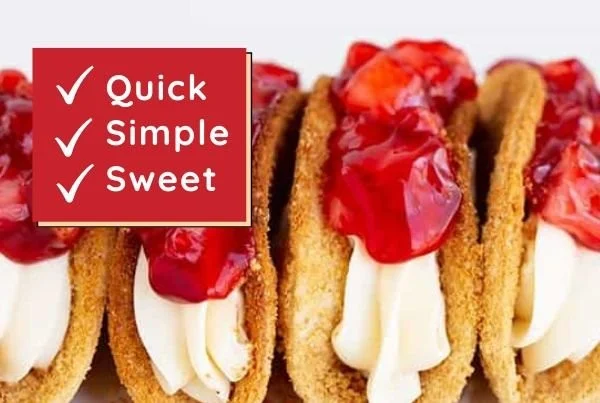 Delicious easy cheesecake tacos with fresh toppings on a plate.