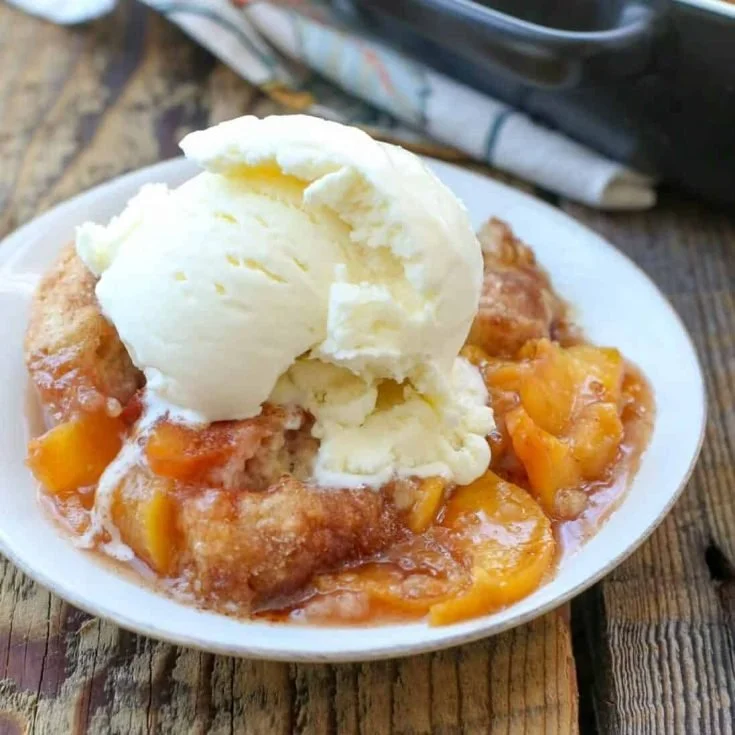 Delicious easy homemade peach cobbler made with fresh and canned peaches.