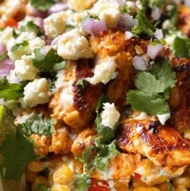 Delicious Mexican Street Corn Chicken Bowl topped with fresh cilantro and lime