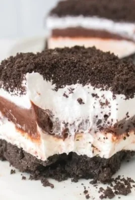 Five Layer Oreo Lasagna Dessert with cookie and cream layers