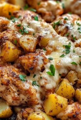 Delicious Garlic Parmesan Chicken served with roasted potatoes
