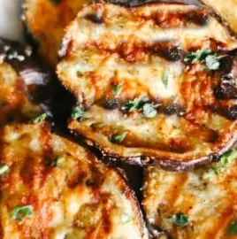 Delicious Garlic Parmesan Grilled Eggplant served on a plate