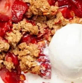 Healthy strawberry crumble dessert with fresh strawberries and crisp topping