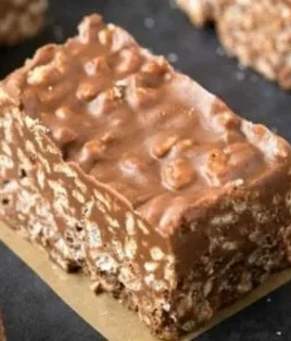Delicious homemade Crunch Bars topped with chocolate and crispy rice.