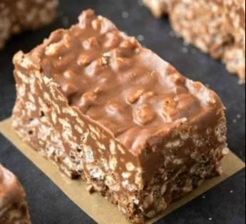 Delicious homemade Crunch Bars topped with chocolate and crispy rice.